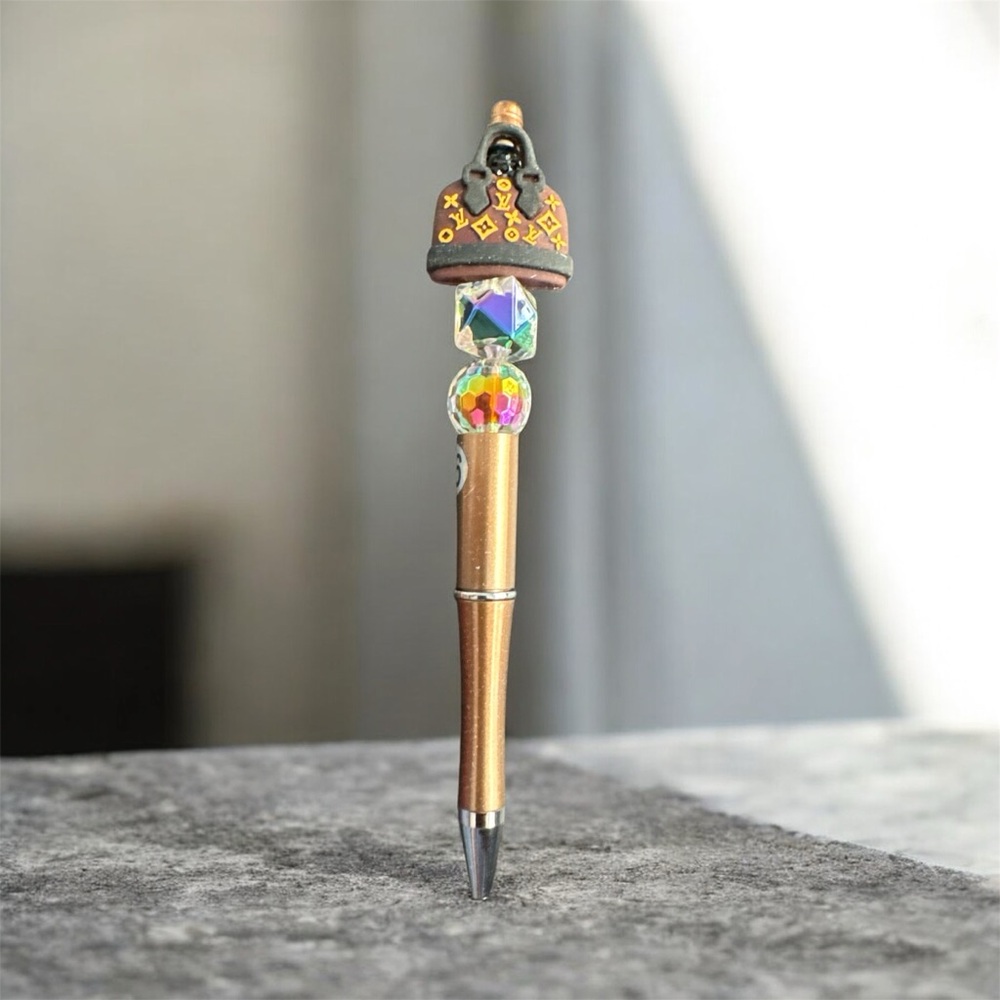 Elegant Gold Pen with Colorful Accents